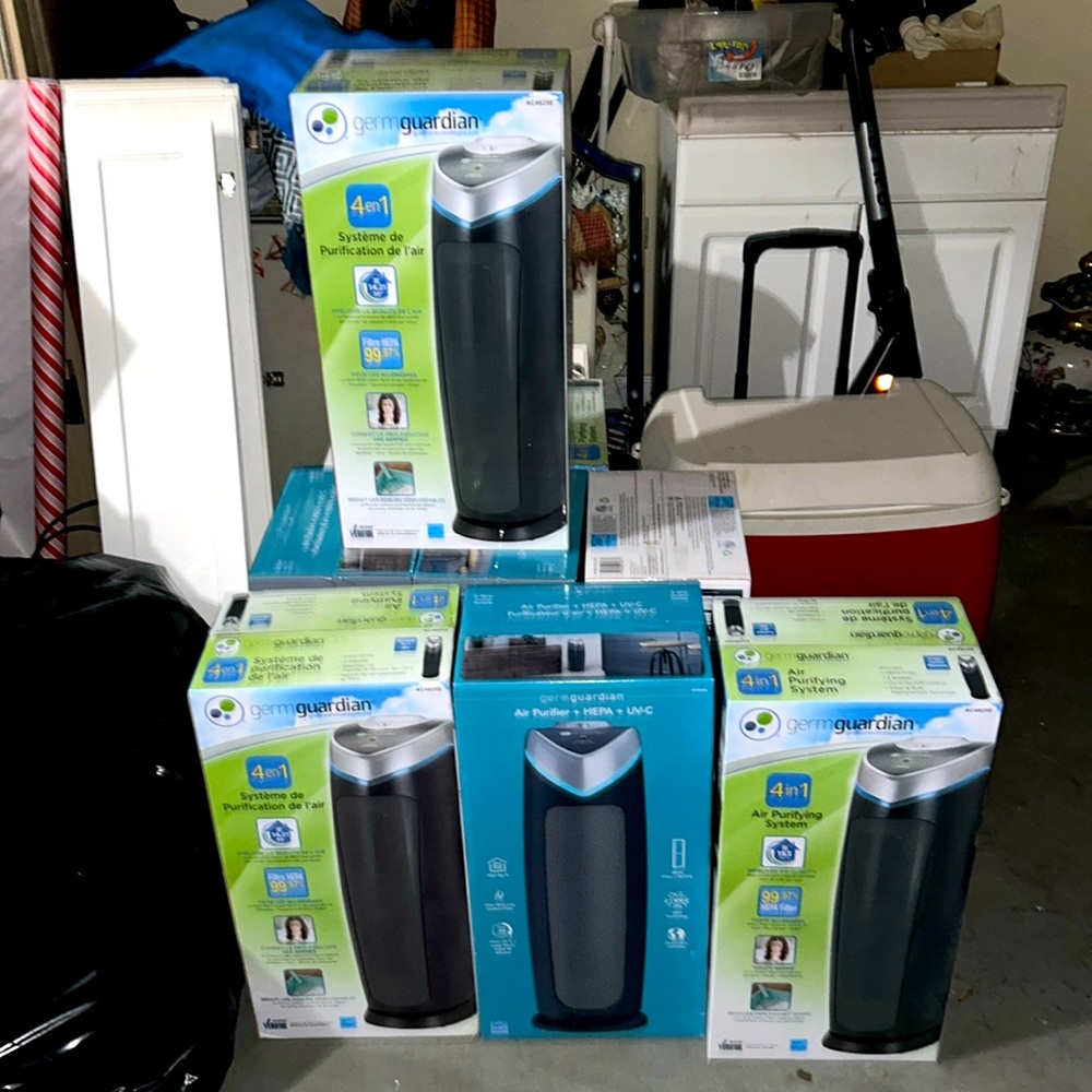 COPY - Two Germ guardians, one green box and one blue box.